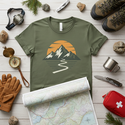 Overhead flat lay of folded hiker t-shirt with compass and topographic map